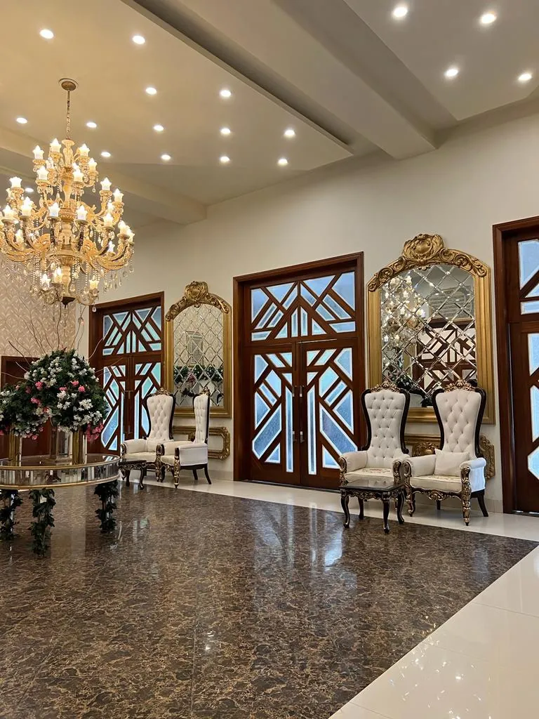 The lobby, with chandeliers and marble